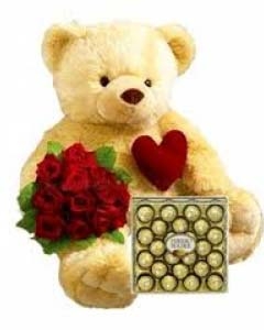 3ft brown teddy w/small pillow,24 Ferrero & 12 red roses